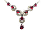 Detailed view of ruby-glass stones & diamantes