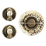 Back of Schiaparelli brooch & earrings