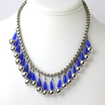 Fringe statement necklace w/blue glass tubes & chrome balls