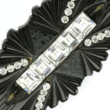 Close-up view of Bakelite & diamante brooch center