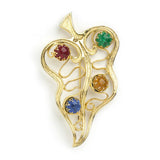 Art glass brooch in gold-tone leaf design