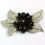 Floral brooch by Miriam Haskell with black glass beads