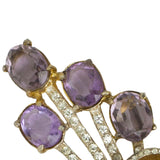 Close-up view of faceted amethyst glass stones