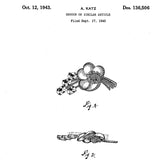 Design patent for Corocraft brooch