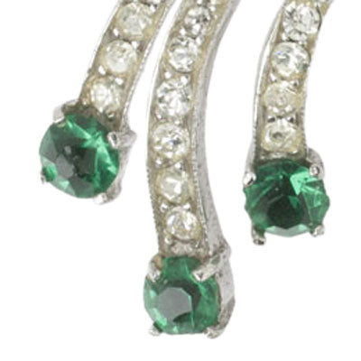 Close-up view of diamantes w/round faux emeralds
