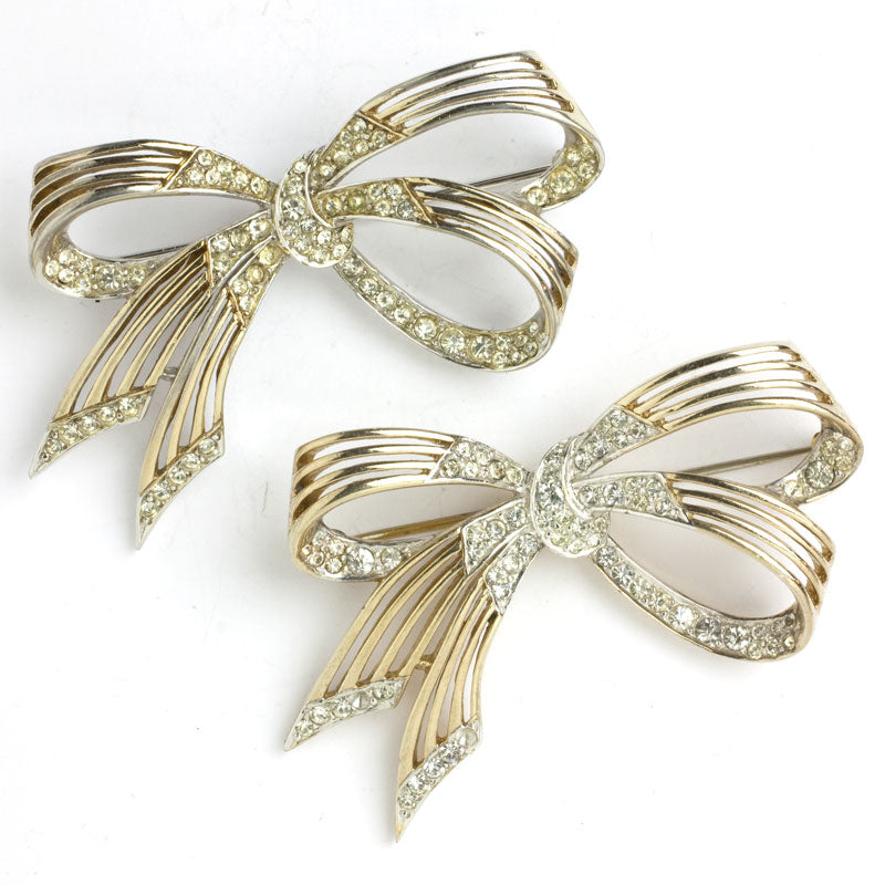 Pair of 1950s brooches with delicate gold & pave ribbons