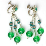 Emerald-glass bead chandelier earrings by Miriam Haskell