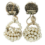 Earring backs showing company's signature ear clip