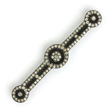 Black and white Deco brooch by Fishel, Nessler