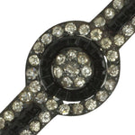 Close-up view, showing bead-set stones
