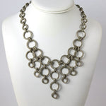 Art Deco bib necklace with silver rings