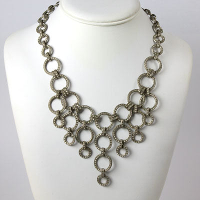 Art Deco bib necklace with silver rings