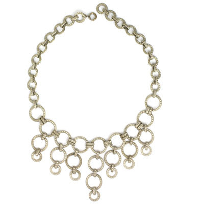 Front of silver ring bib necklace