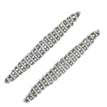 Pearl and diamante pins by Hattie Carnegie