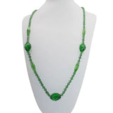 Long beaded necklace w/emerald glass beads