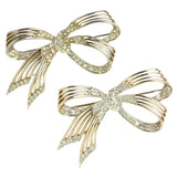Pair of 1950s brooches with delicate gold & pave ribbons