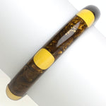 Bakelite bangle bracelet in marbled brown with 6 yellow dots