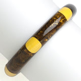 Bakelite bangle bracelet in marbled brown with 6 yellow dots