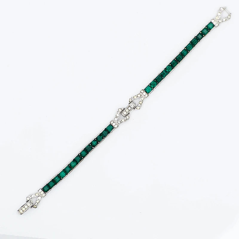 Front of vintage emerald bracelet, showing 2 diamante clasps