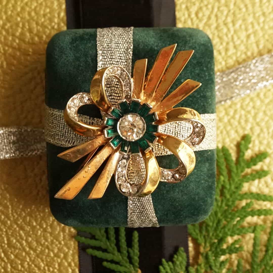 Mazer Bros. brooch used in gift wrapping