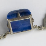 Side view of molded-lapis-glass stone