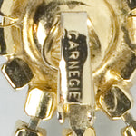 Maker's mark on ear clip