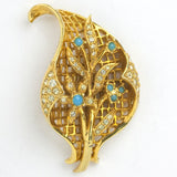 Vintage gold brooch with turquoise & diamanté accents