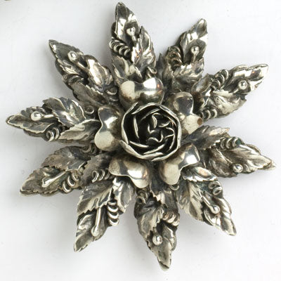 Richly-detailed sterling silver brooch