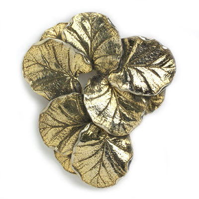 Brooch w/layered trios of gold-tone leaves