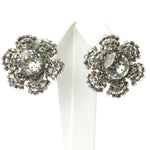 Diamante earrings shaped like flowers by Miriam Haskell