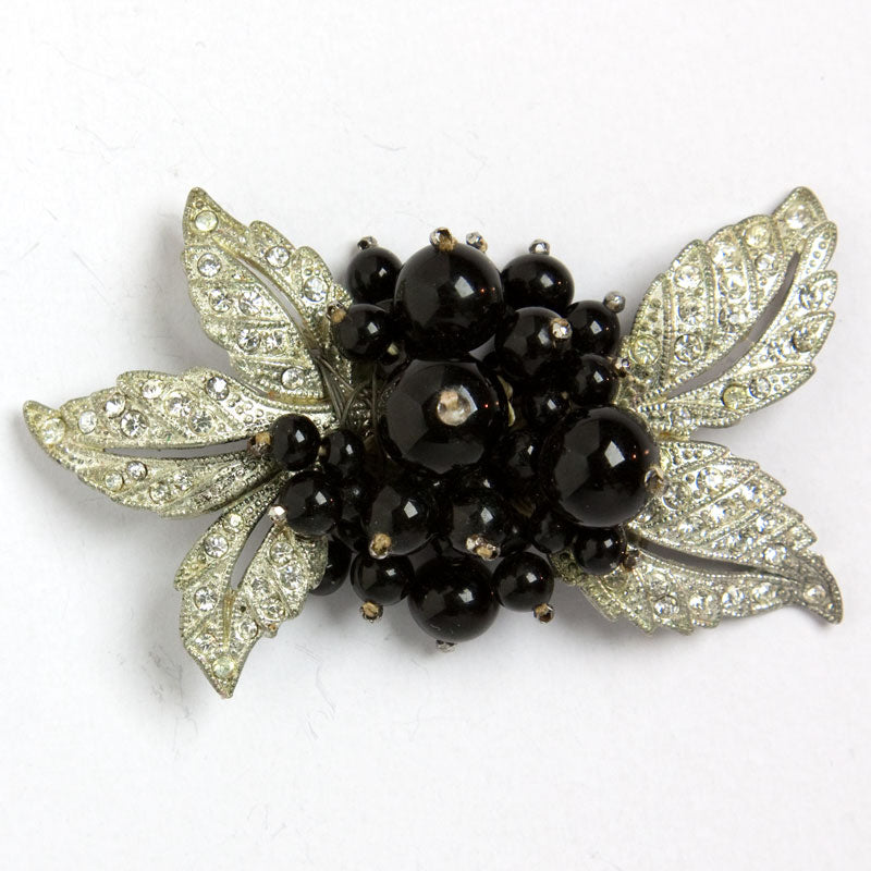 Floral brooch by Miriam Haskell with black glass beads