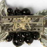 Close-up view of brooch construction