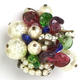 Close-up view of pearls, hand-wound-glass leaves & rondelles