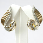 Gold swirl earrings w/pavé by Marcel Boucher