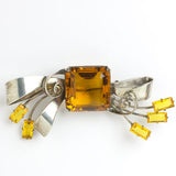 Citrine pin in sterling bow setting