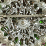 Close-up view of brooch construction