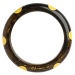 Bottom view of Bakelite bangle with 6 dots