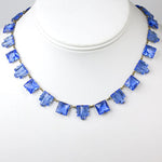 Faux sapphire necklace with square & step-pattern stones