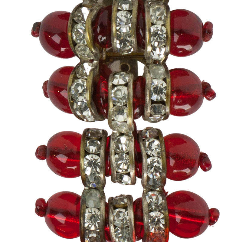 Close-up view of ruby bead brooch
