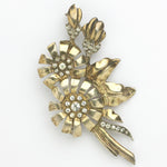 Gold plated flower brooch with diamante by Otis