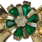 Close-up view of emerald glass & diamante flower
