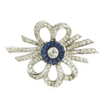 1940s brooch with bows of diamantes & sapphire glasss