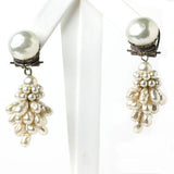 Pearl cluster earrings by Louis Rousselet