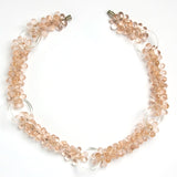 Pink bead necklace with clear glass rings