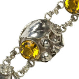 Close-up view of sterling details w/citrine glass stone