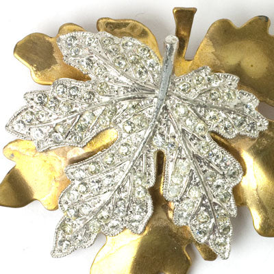 Close-up view of maple leaf brooch